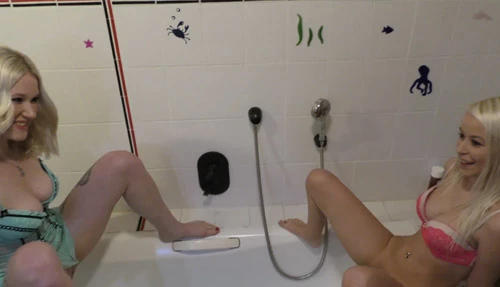 SexyJenJen, the hot blonde German slut, gives a hot piss session with her girlfriend while wearing sexy lingerie and sitting on the bathtub!: Watch on EroticOnly